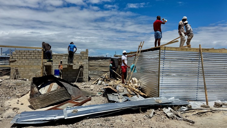 Fire survivors rebuild with bricks despite City regulations